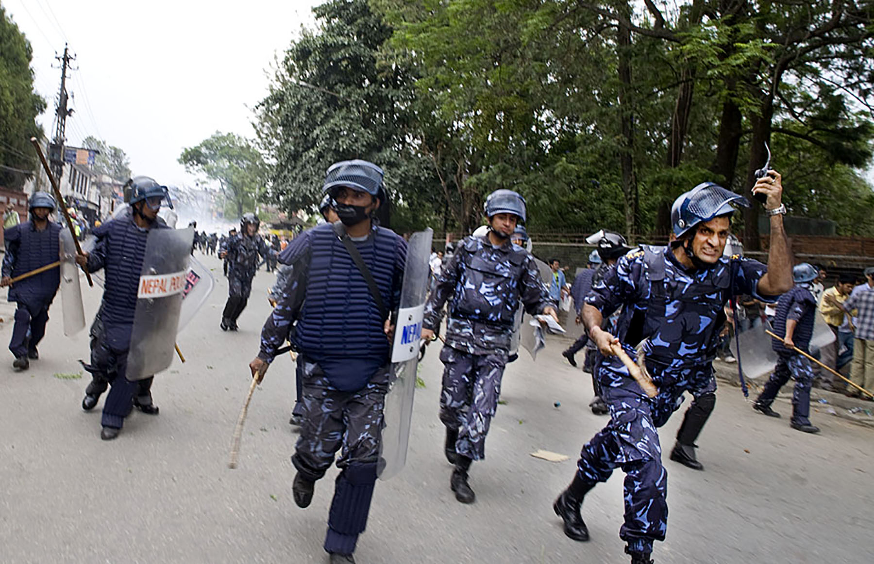Nepal Police chase after protestors, Kathmandu, Nepal (2009)