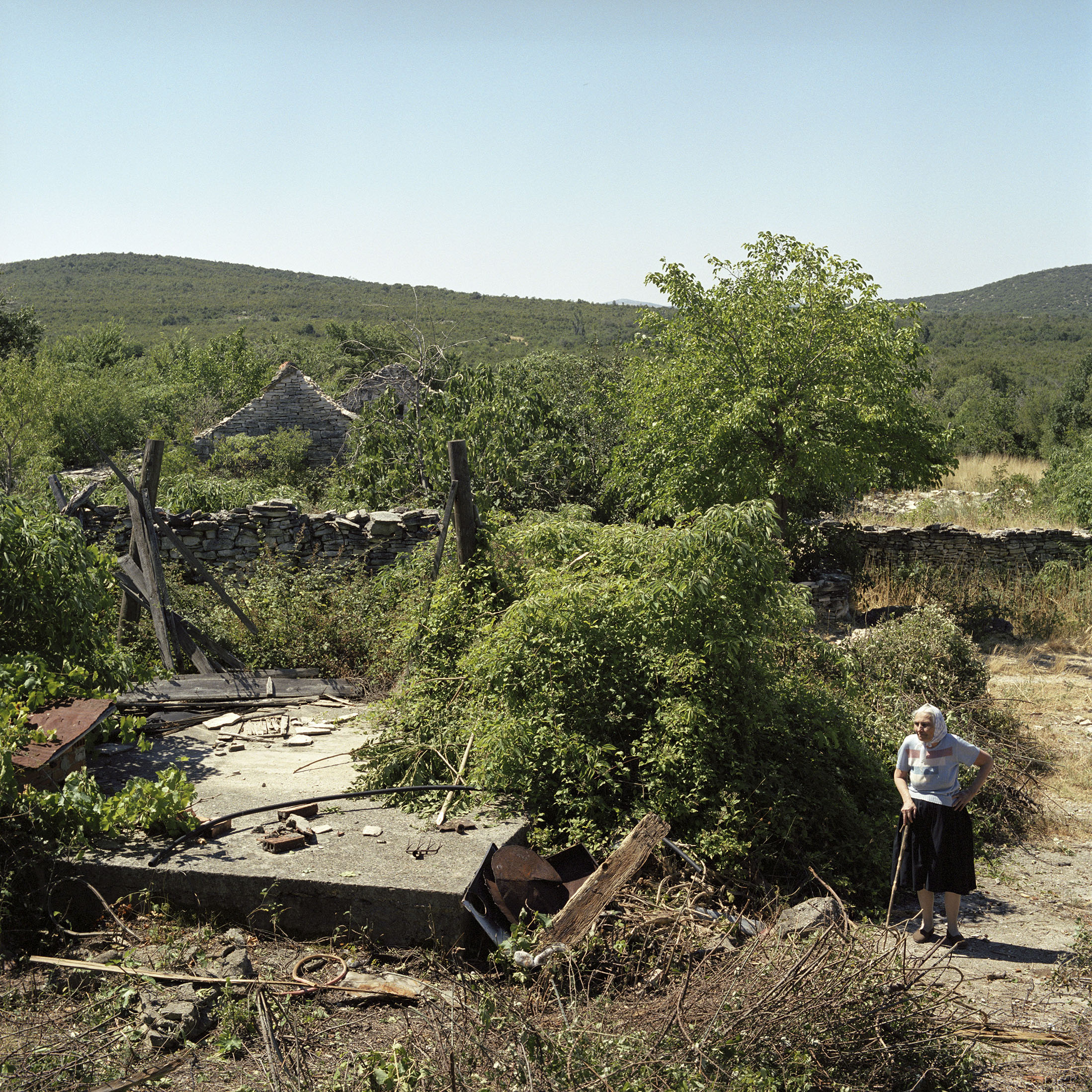  Maria Banic returns to her destroyed home near the town of Benkovac in the South of Croatia for the first time in eleven years. She and her husband Branko were part of a returnee convoy from Serbia organised by the UNHCR and Croatian Red Cross.   