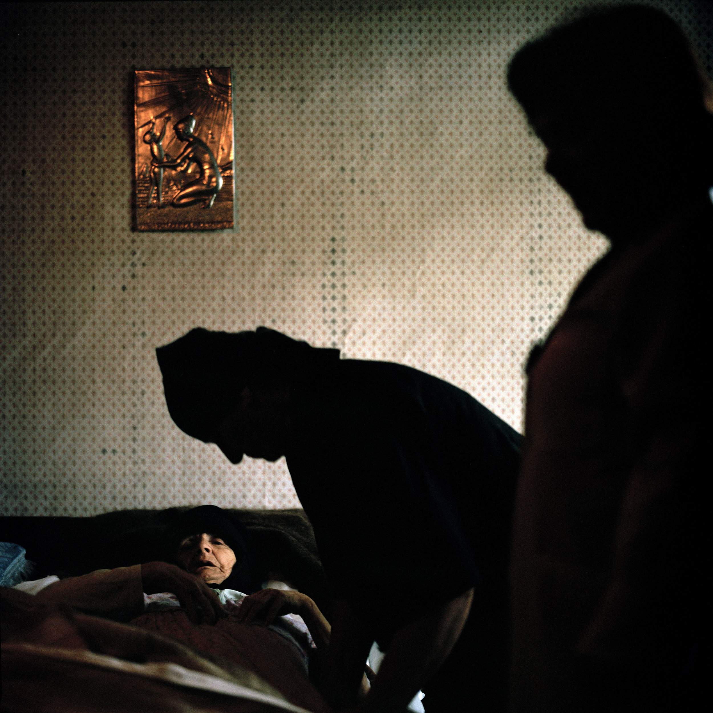 Doctor Thsira Chaprwa ,from Gali’s only functioning hospital, treats a sickly woman during a home visit in the village of Perwelli Gali. Due to remoteness, lack of transport and bad roads many vulnerable people in Gali cannot reach the hospital. As