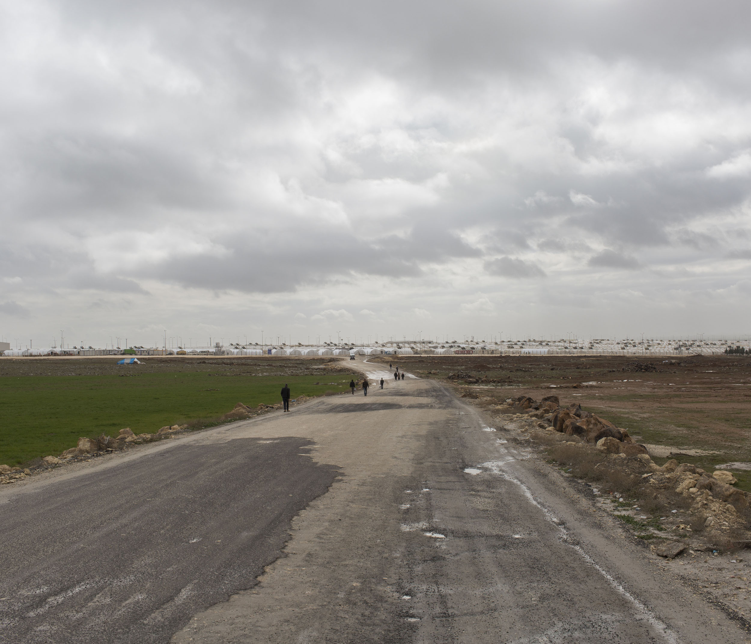  Syrian refugees file in and out of Suruc camp in the South East of Turkey near the border with Syria. Built in the wake of the massive influx of mainly Kurdish Syrian refugees from the nearby Syrian city of Kobane, it is Turkey’s largest camp with a