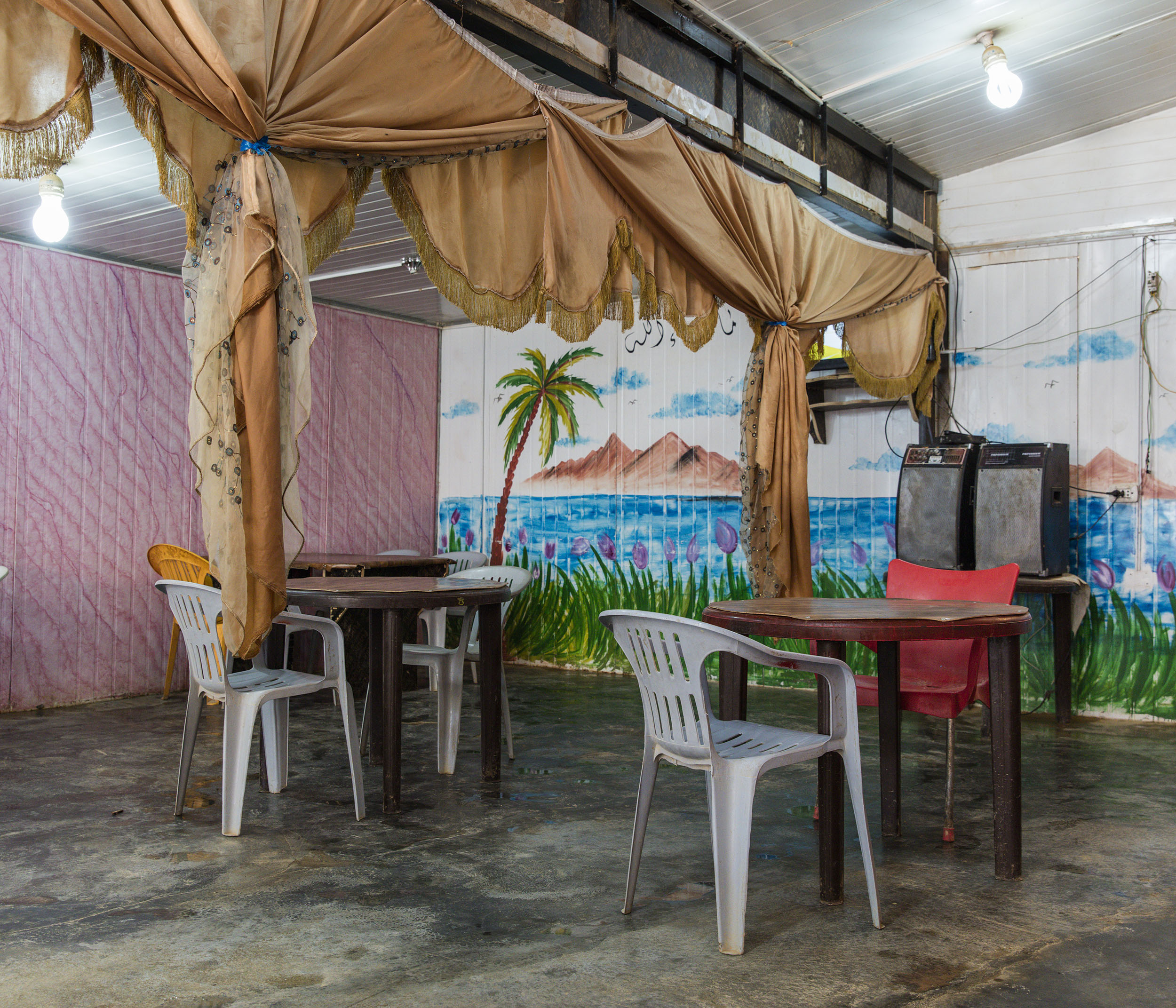  A brightly decorated restaraunt owned and run by  Syrian refugee in Zaatari camp. 