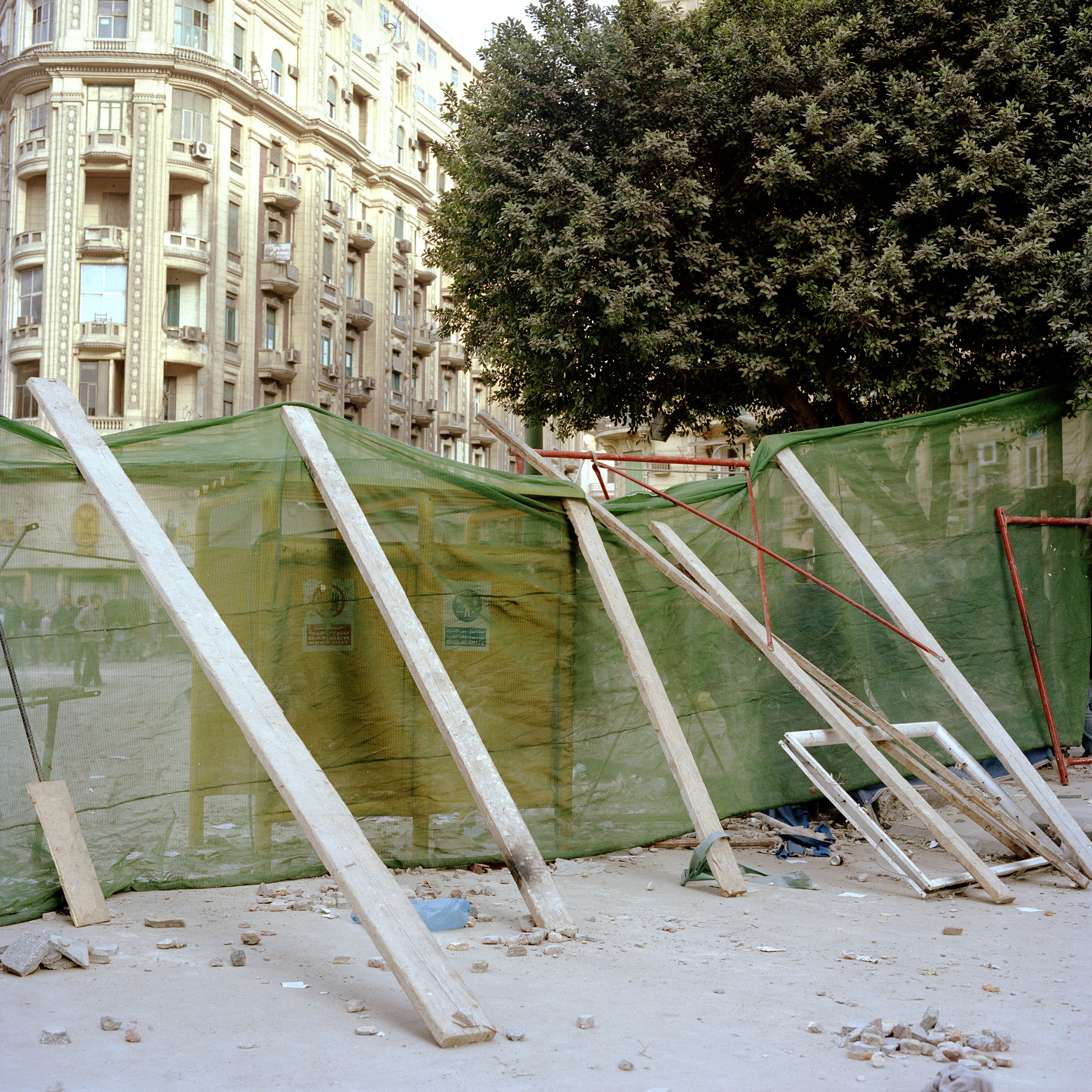  A barricade built by anti government protesters stands on a back-street  leading off Tahrir square. 