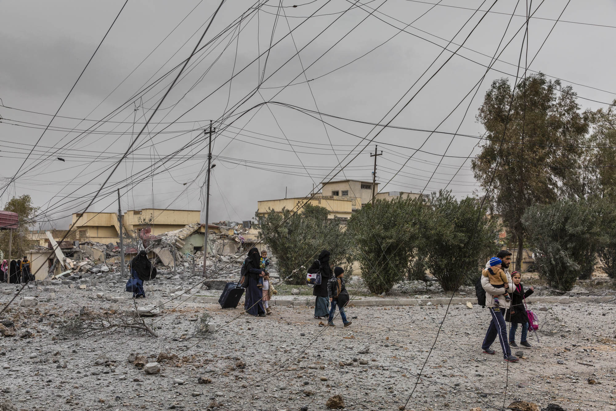  Civilians fled heavy clashes between Iraqi special forces and ISIS militants early in the morning in the Jadidah neighbourhood of west Mosul. Iraq - March 2017 