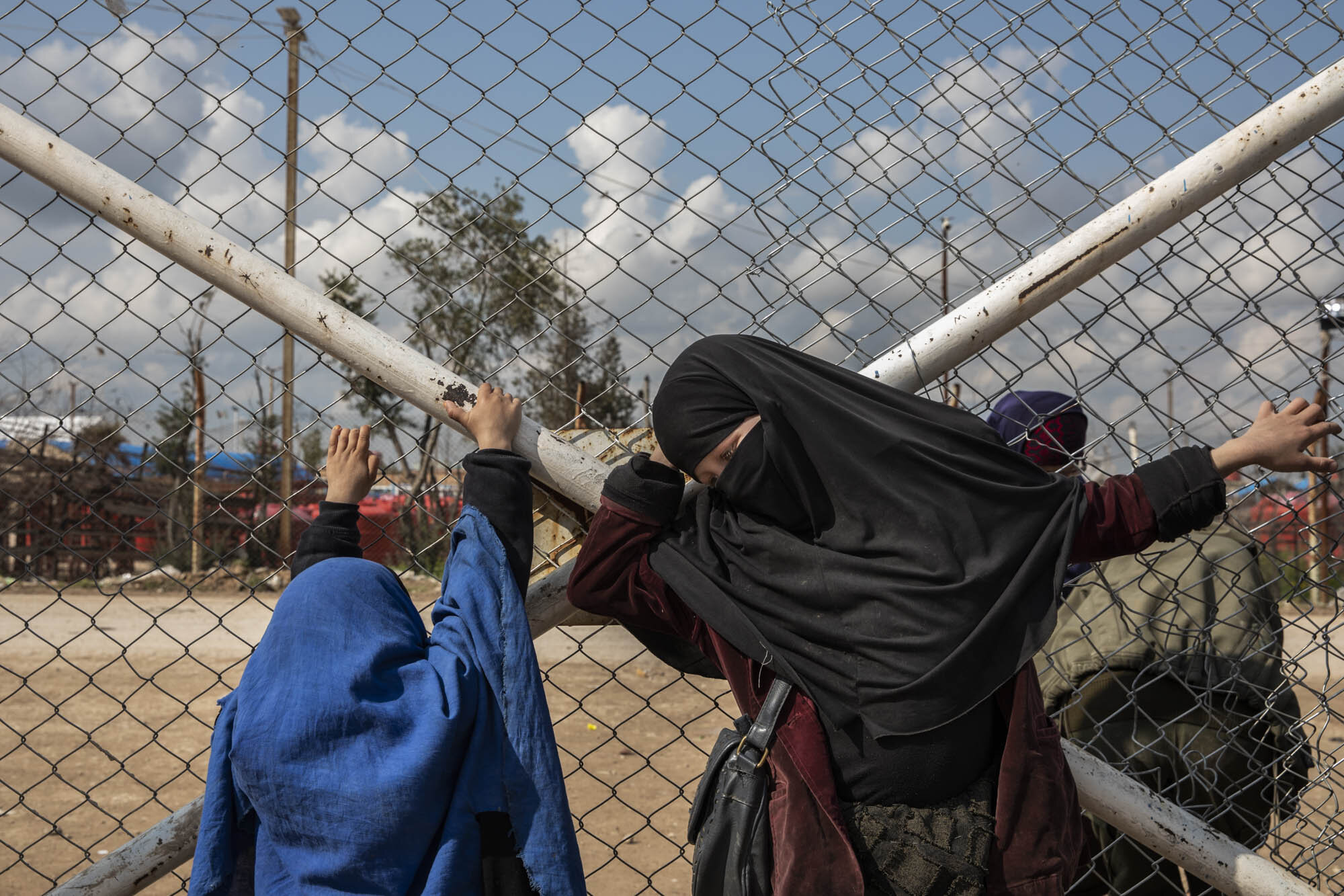  Two young girls languished inside the foreigners section for the wives and children of ISIS members at al-Hol detention camp in north east Syria. At its peak more than eighty thousand people were held in al-Hol, with more than ten thousand of that n