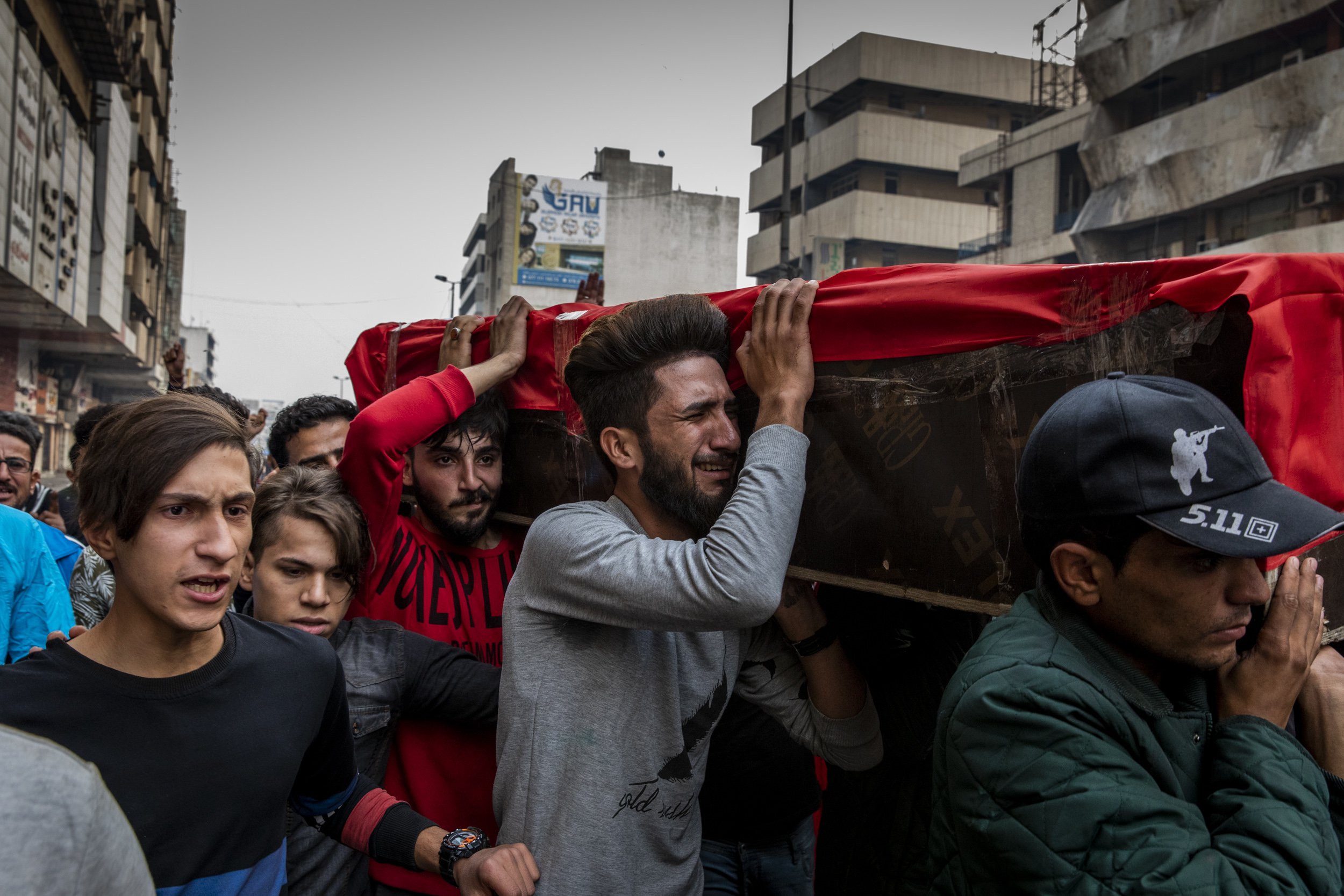  Friends and family members paraded the coffin of 16-year-old Hussein Abed, who was killed by Iraqi security forces , through the streets of Baghdad. 