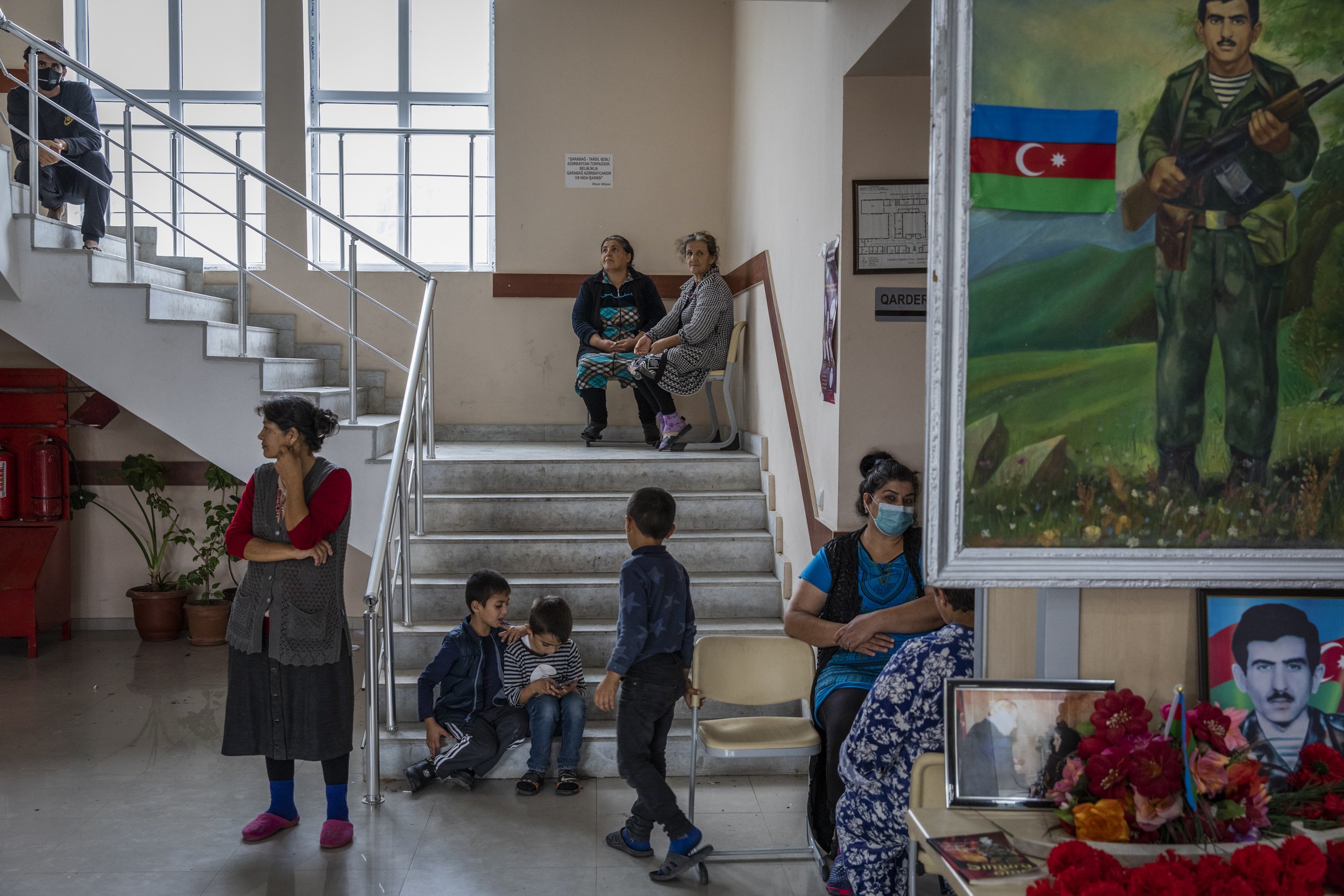 Women and children gathered in the hallway of a school in the city of Barda that had been turned in to a shelter for people who had been displaced by fighting in the frontline towns and villages around Terter and Agdam in Azerbaijan.