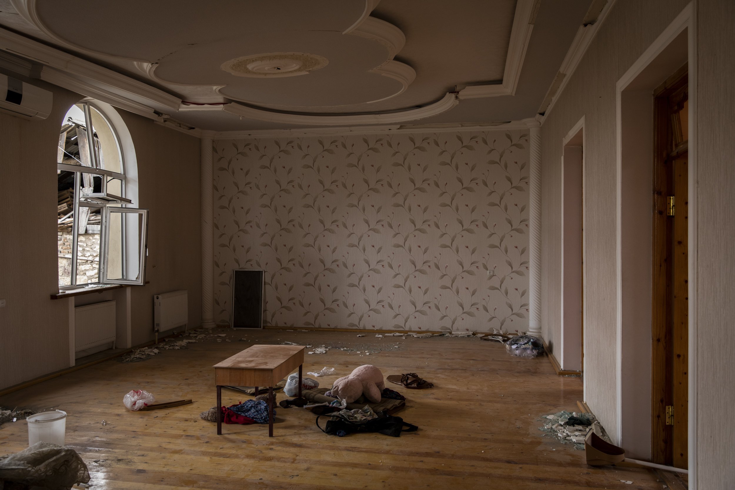A pink teddy bear lay in the middle of the destroyed interior of a house in the Cevathan neighbourhood of Ganja, Azerbaijan’s second largest city. The residential area was hit by a scud missile fired by Armenian forces on the the 17th of Octobe