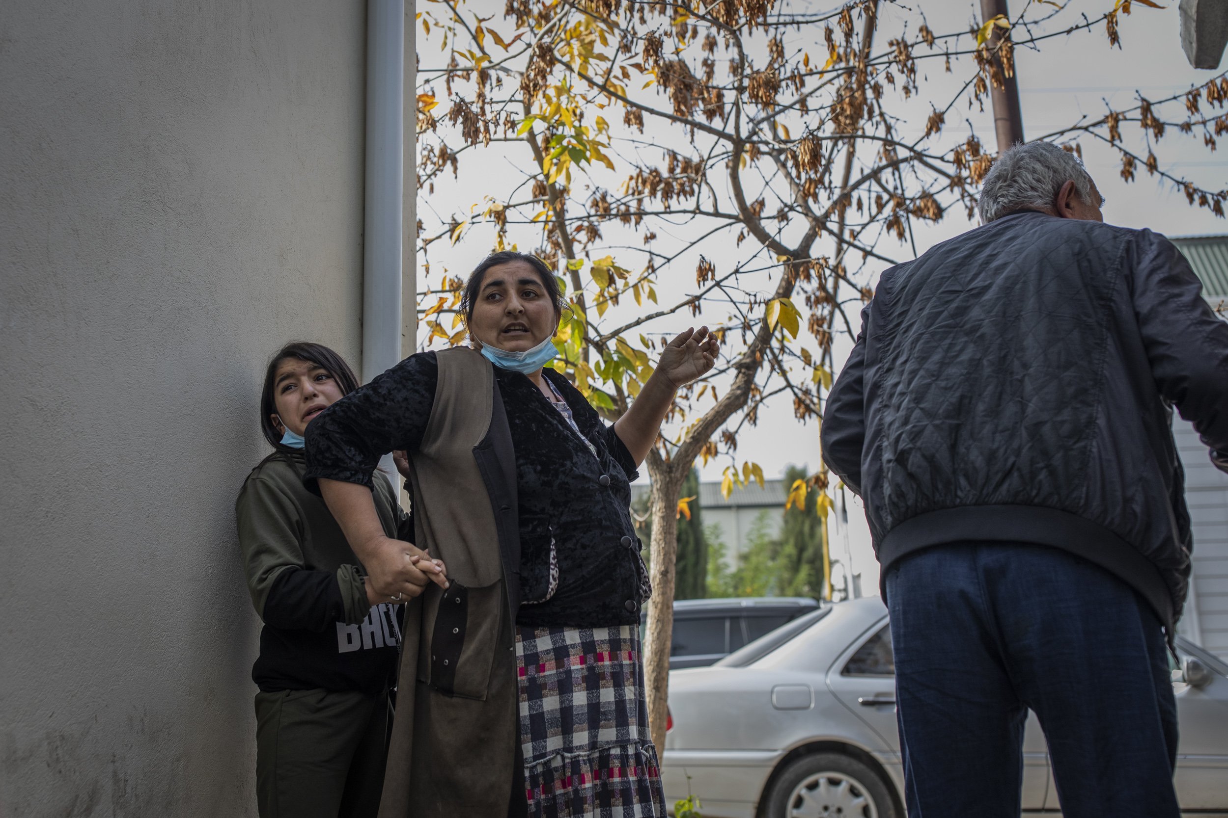  People took cover in an alleyway in the Azerbaijani city of Barda during a rocket attack launched by Armenian forces. 