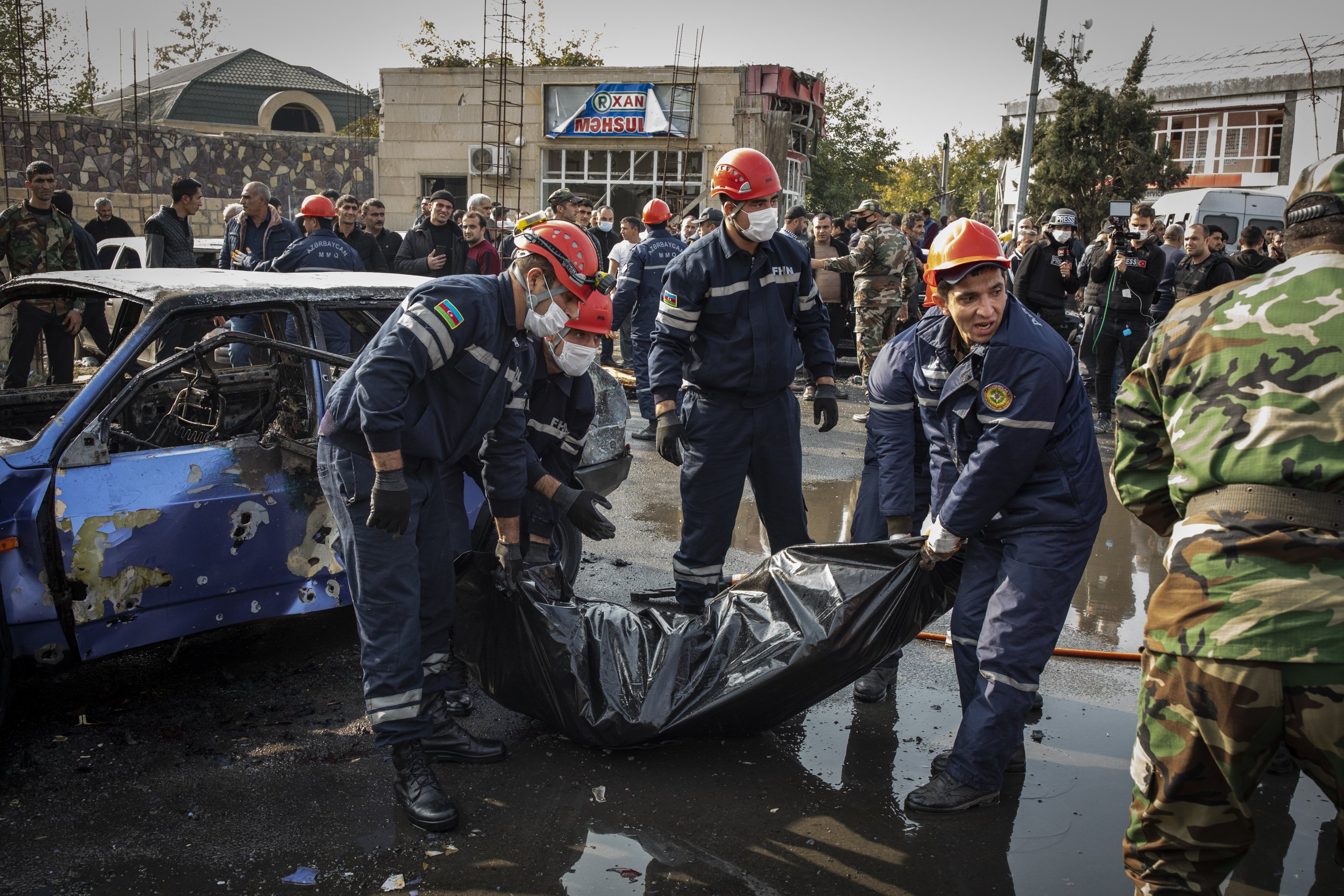  Rescue workers retrieved the body of a man who was killed in his car during a rocket attack launched by Armenian forces targeting the city of Barda, Azerbaijan. Human Rights Watch and Amnesty International quickly concluded that the weapons used on 