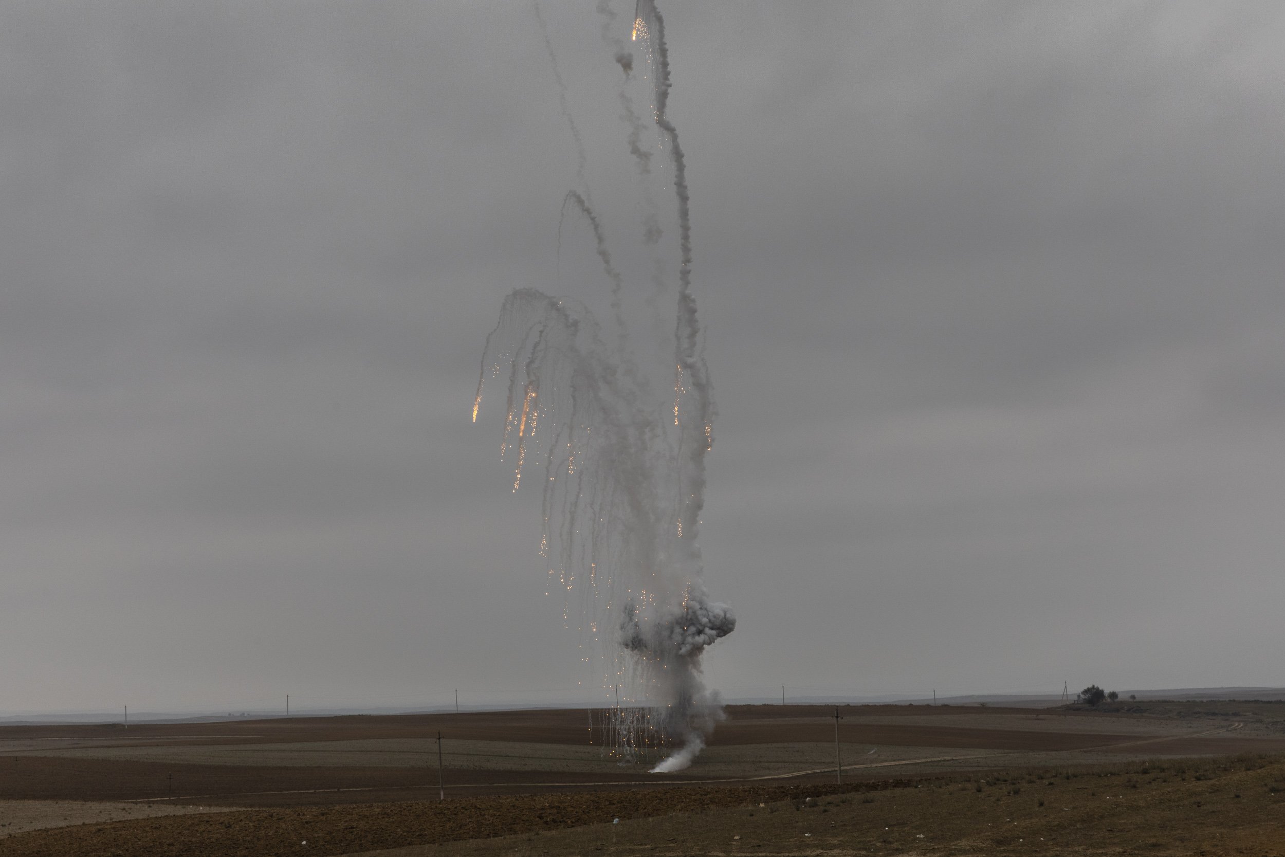 Azerbaijani bomb disposal experts detonated an incendiary explosive that had failed to explode after being fired by Armenian forces at Azerbaijani troops during the 6 week war over Nagorno Karabakh. Fizuli region, Azerbaijan. 