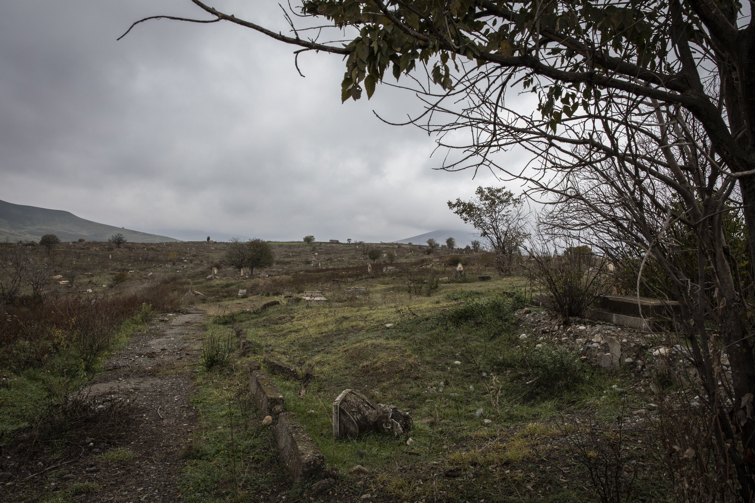 A damaged bust lay on the ground of the destroyed cemetery of Fizuli town. Once a rich agricultural part of the country, the area was left in ruin nearly 30 years of neglect under Armenian control. 130,000 mainly ethnic Azeris were displaced from th
