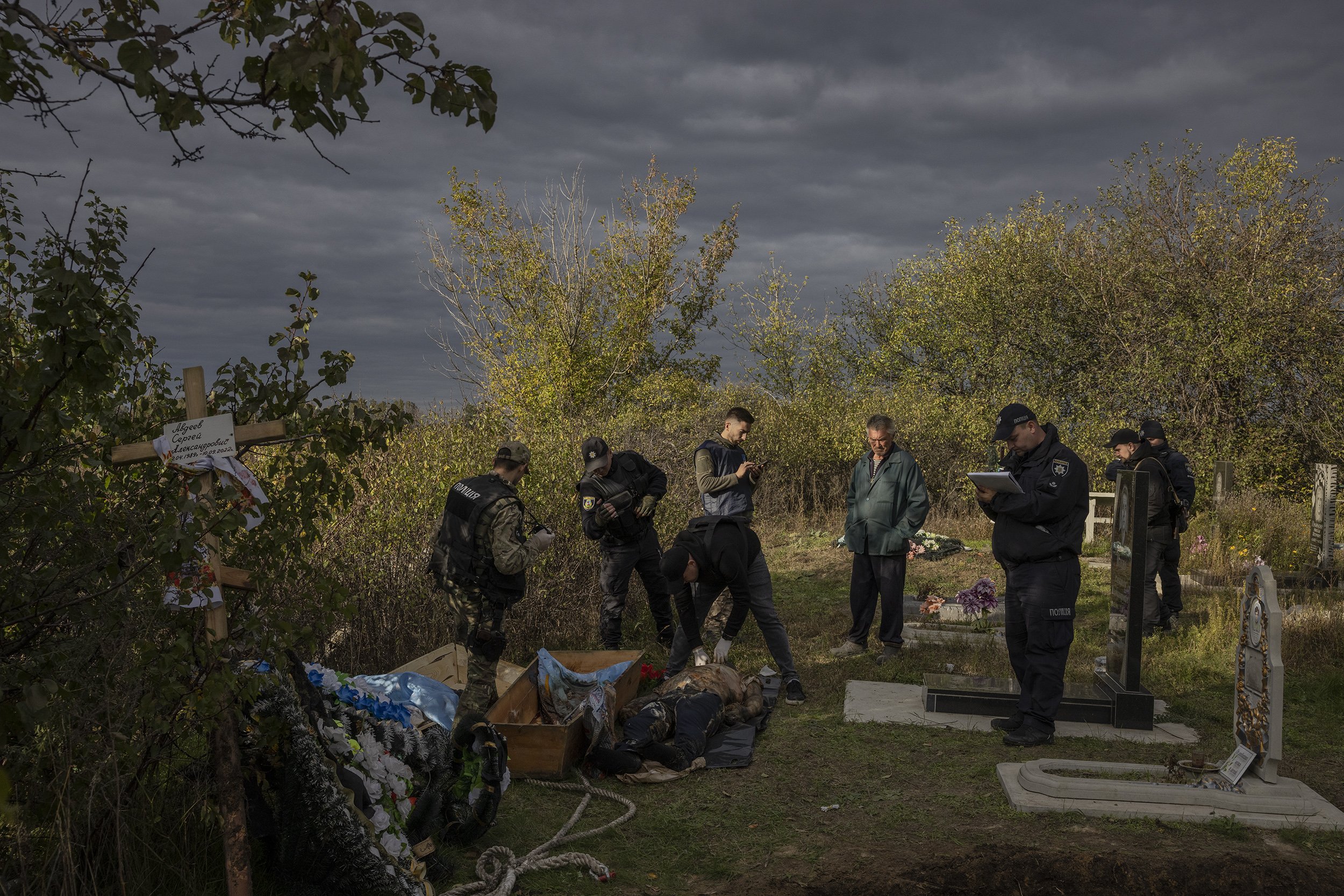  War crimes investigators conducted a preliminary examination, having exhumed the body of Serhii Avdeev, who was abducted and killed by Russian forces near his home village of Borova in Ukraine’s east. October, 2022. 