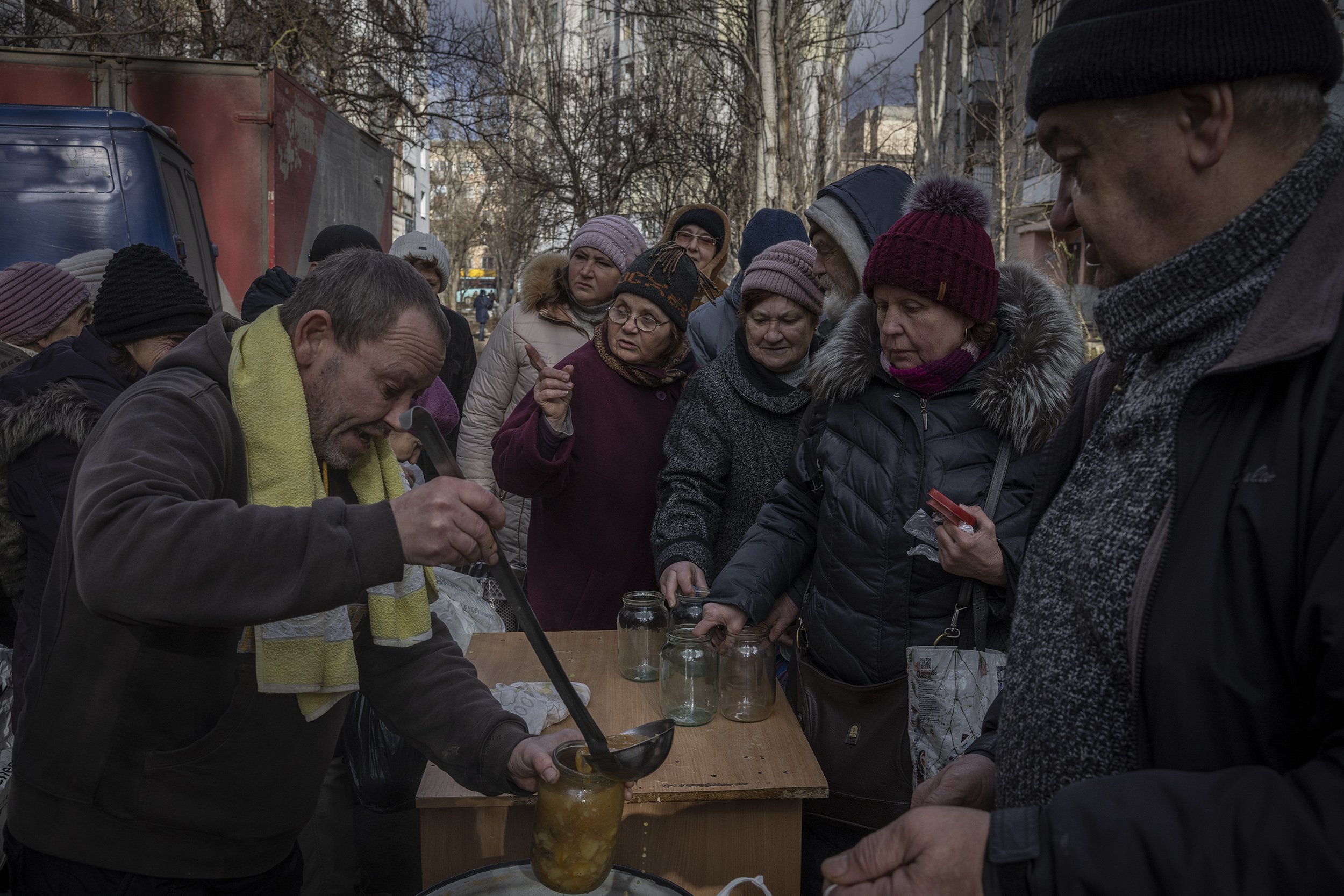  People who had remained in the liberated city of Kherson, lined up to receive hot soup at a handout organised by Volunteers. Although liberated in mid November 2022, the situation in Kherson deteriorated as Russian forces began to shell the city reg