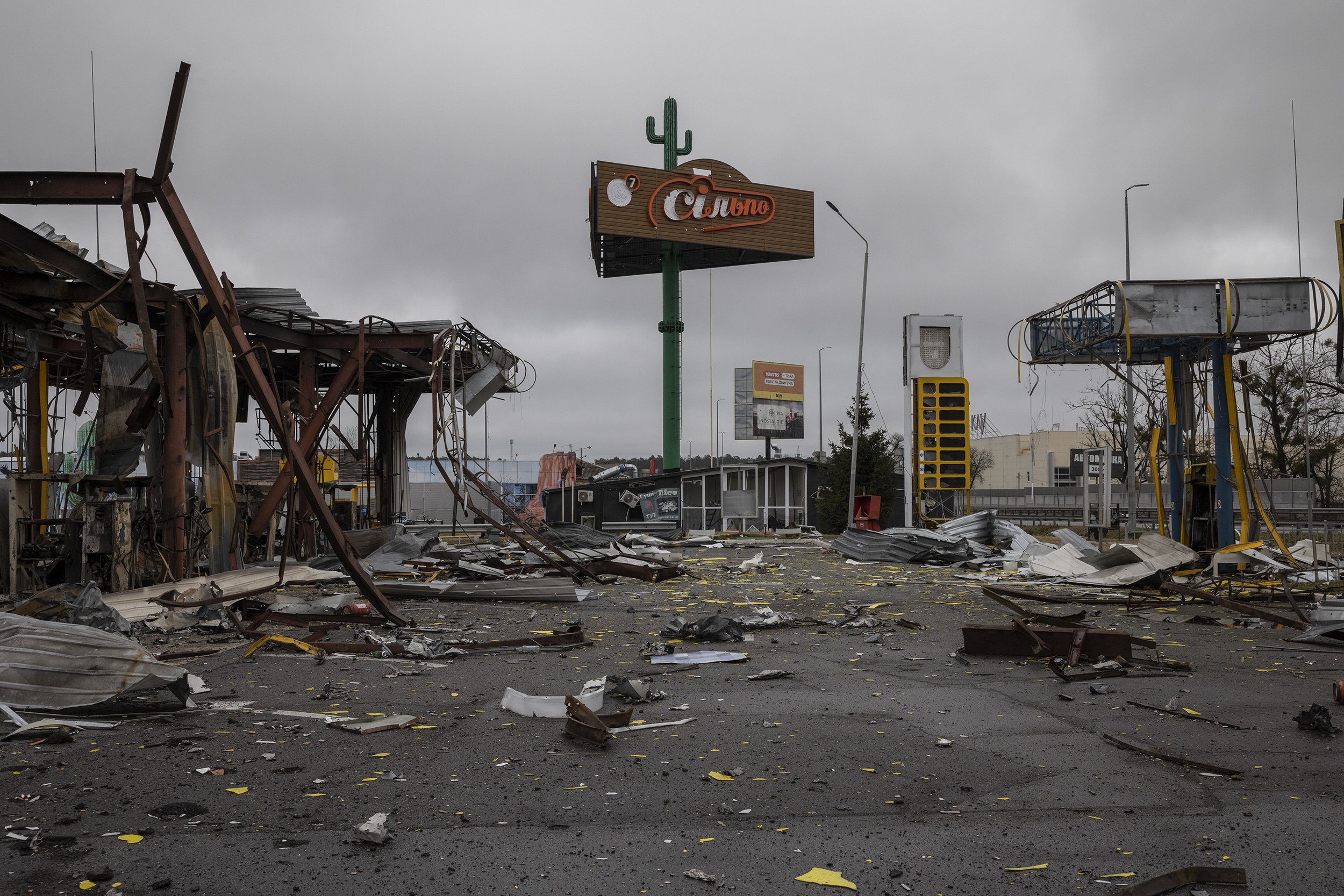  Debris littered the ground at a heavily destroyed gas station on the main highway leading west out of Kyiv. Russian forces were driven from the area just 2 days before, as they abandoned their attempt to take the capital and retreated back across th