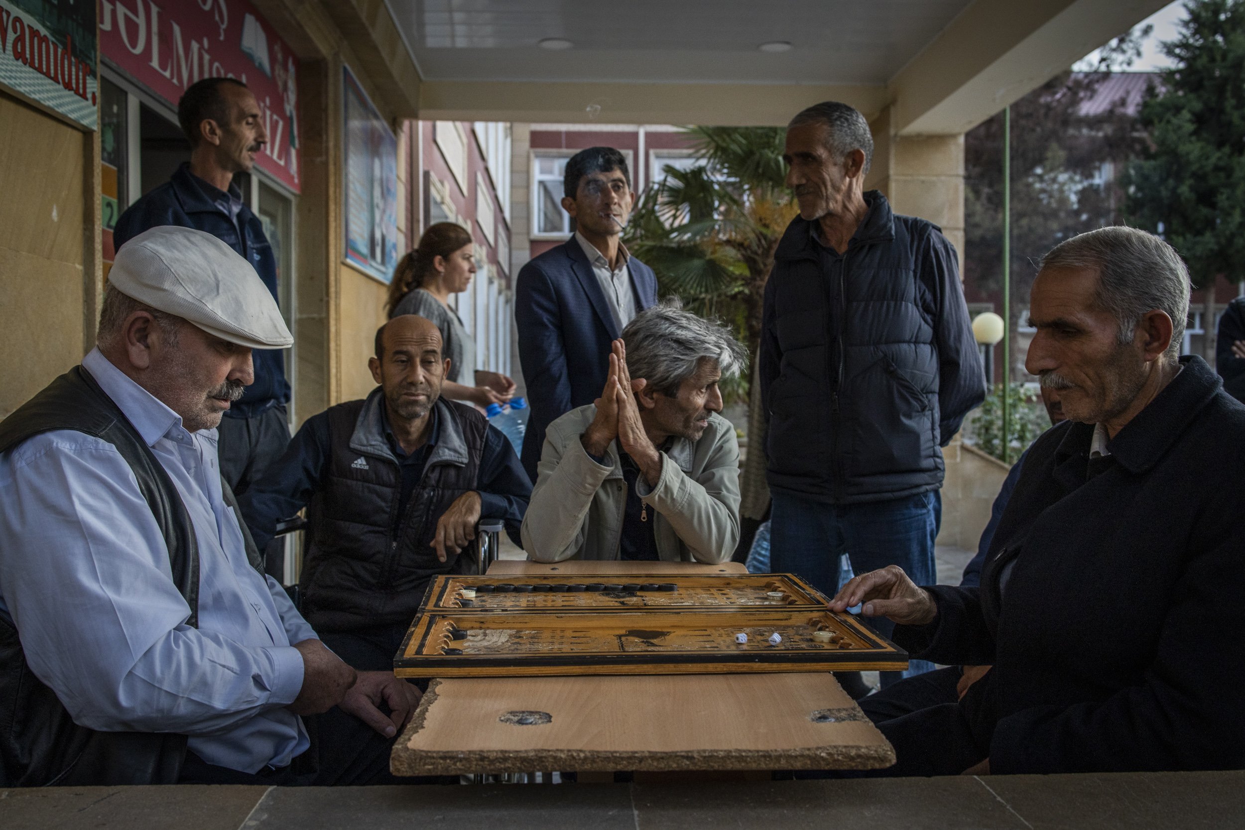 Men played backgammon at a school in the city of Barda that has been turned in to a shelter for people who have been displaced by fighting in the frontline towns and villages around Terter and Agdam.