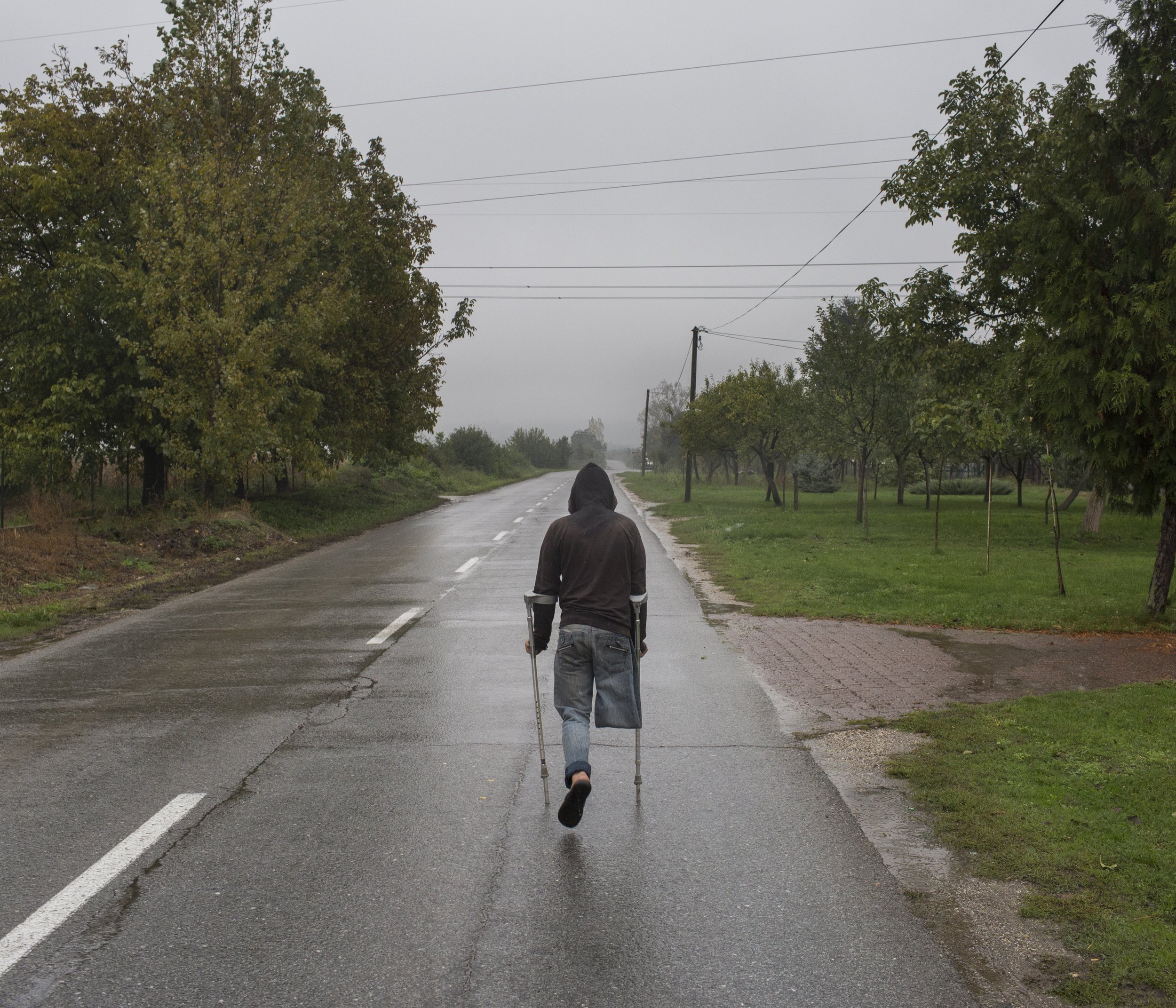 Lais, a Syrian refugee who had lost his leg in an airstrike two year before, walked the the final stretch of the journey towards the border between Serbia and Croatia.