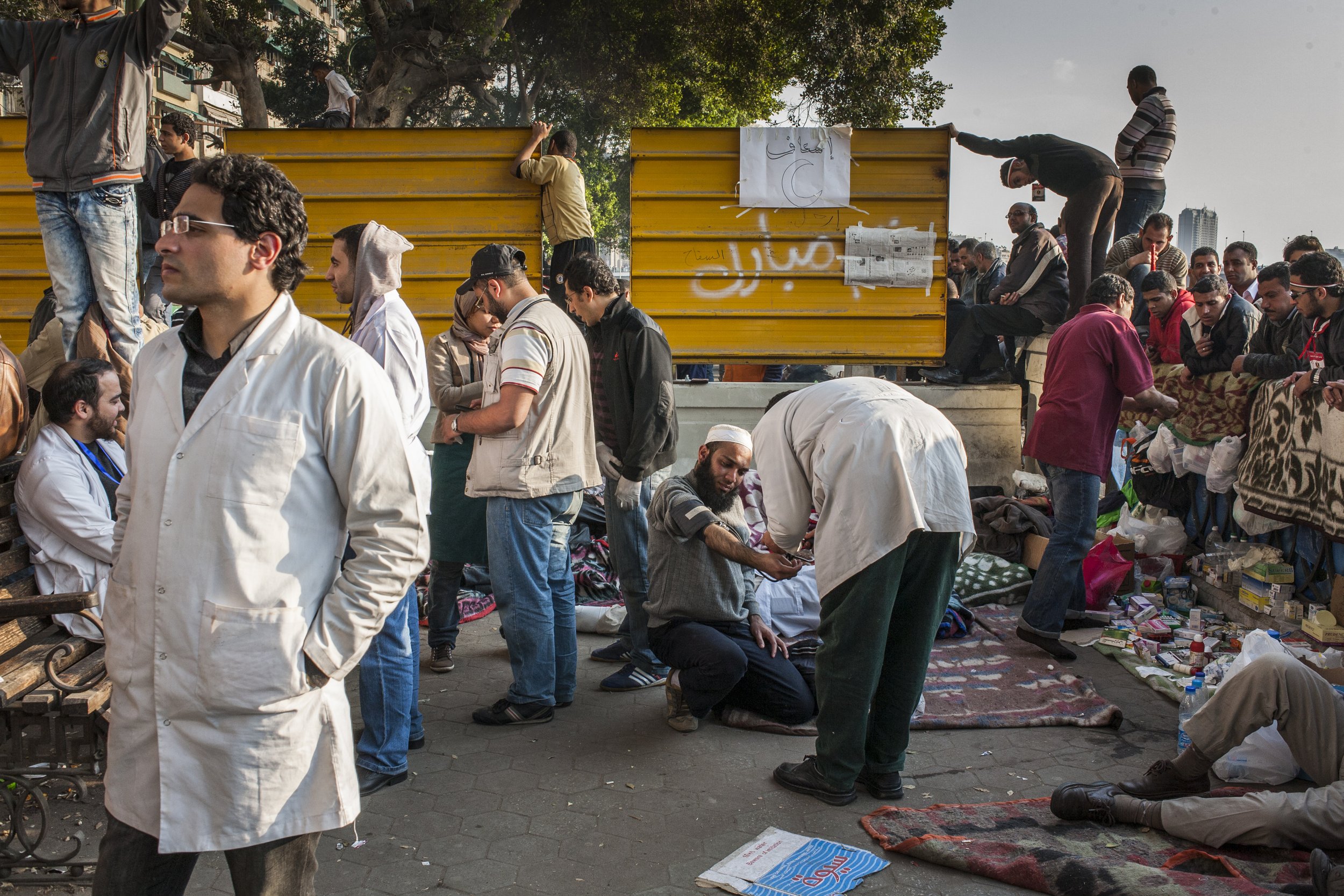  A man is treated by a volunteer doctor at the first aid point set up on the morning of 11/02/2011 to cope with any injuries sustained to protesters.  
