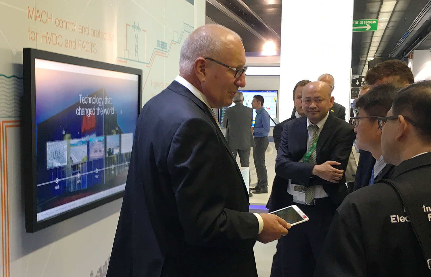 A representative of ABB using the FACTS presentation during Cigré in Paris 2016
