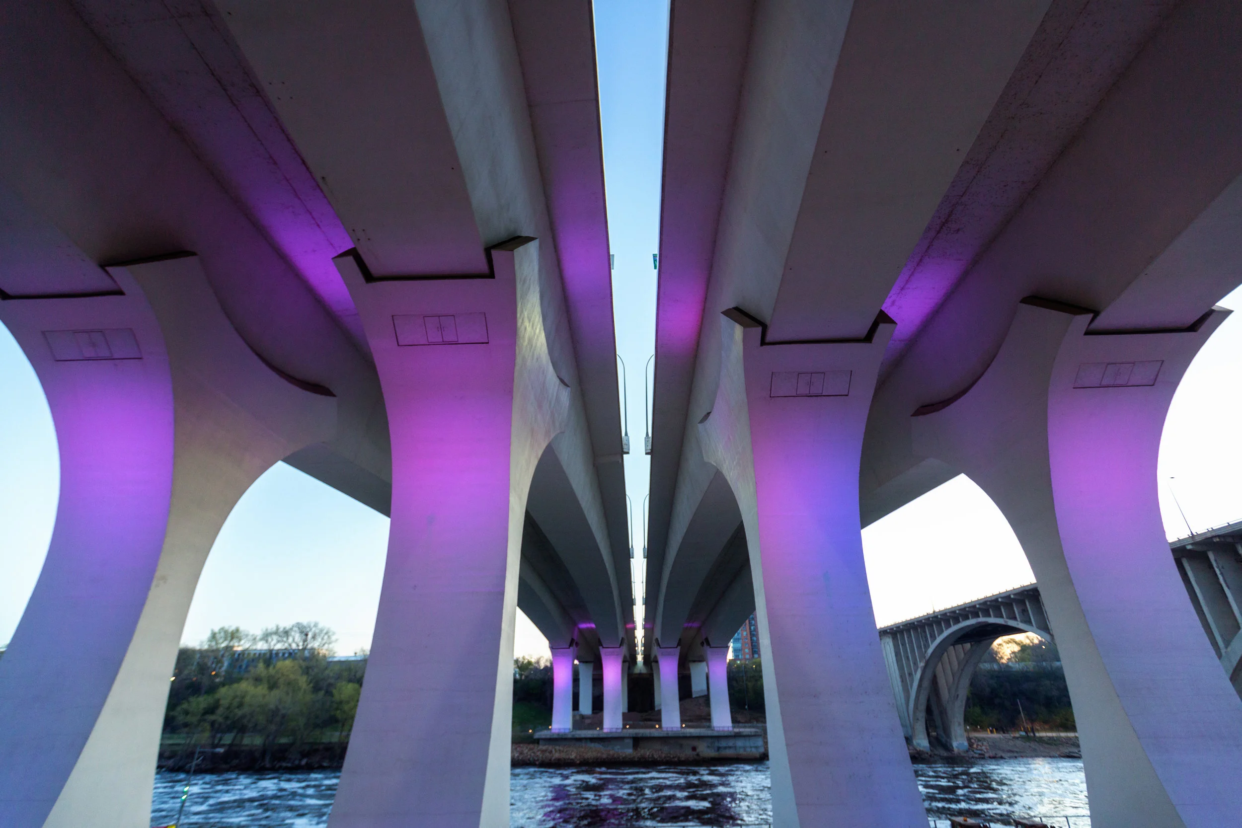 I-35W Bridge glowing purple in tribute to Prince, Minneapolis MN