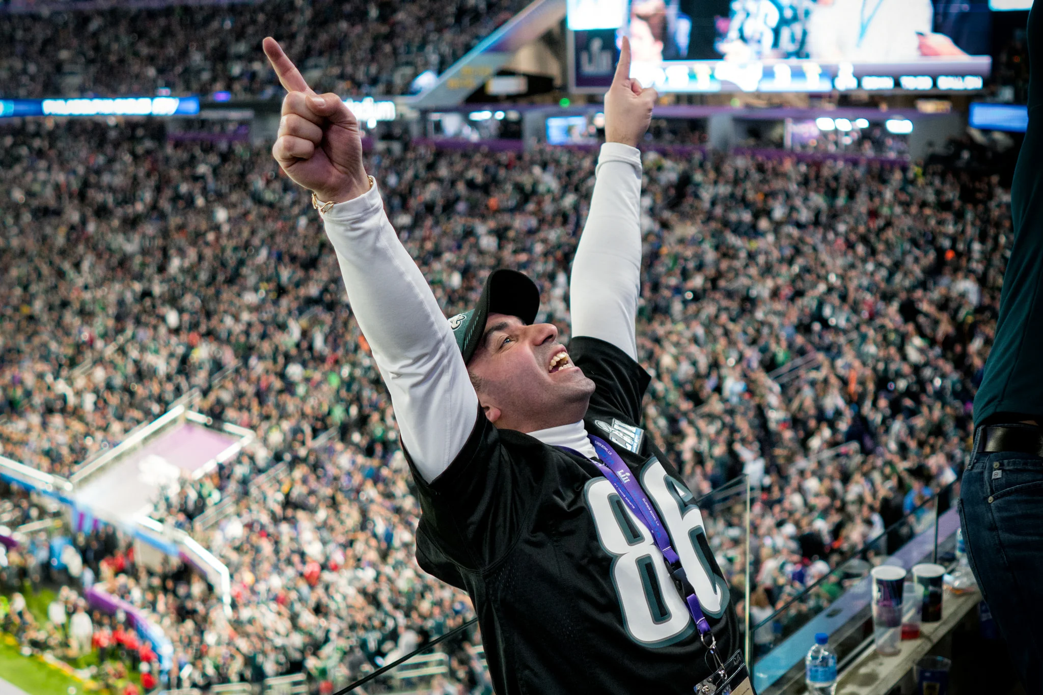 An Eagles fan celebrates in the stands at Super Bowl LII, Minneapolis MN
