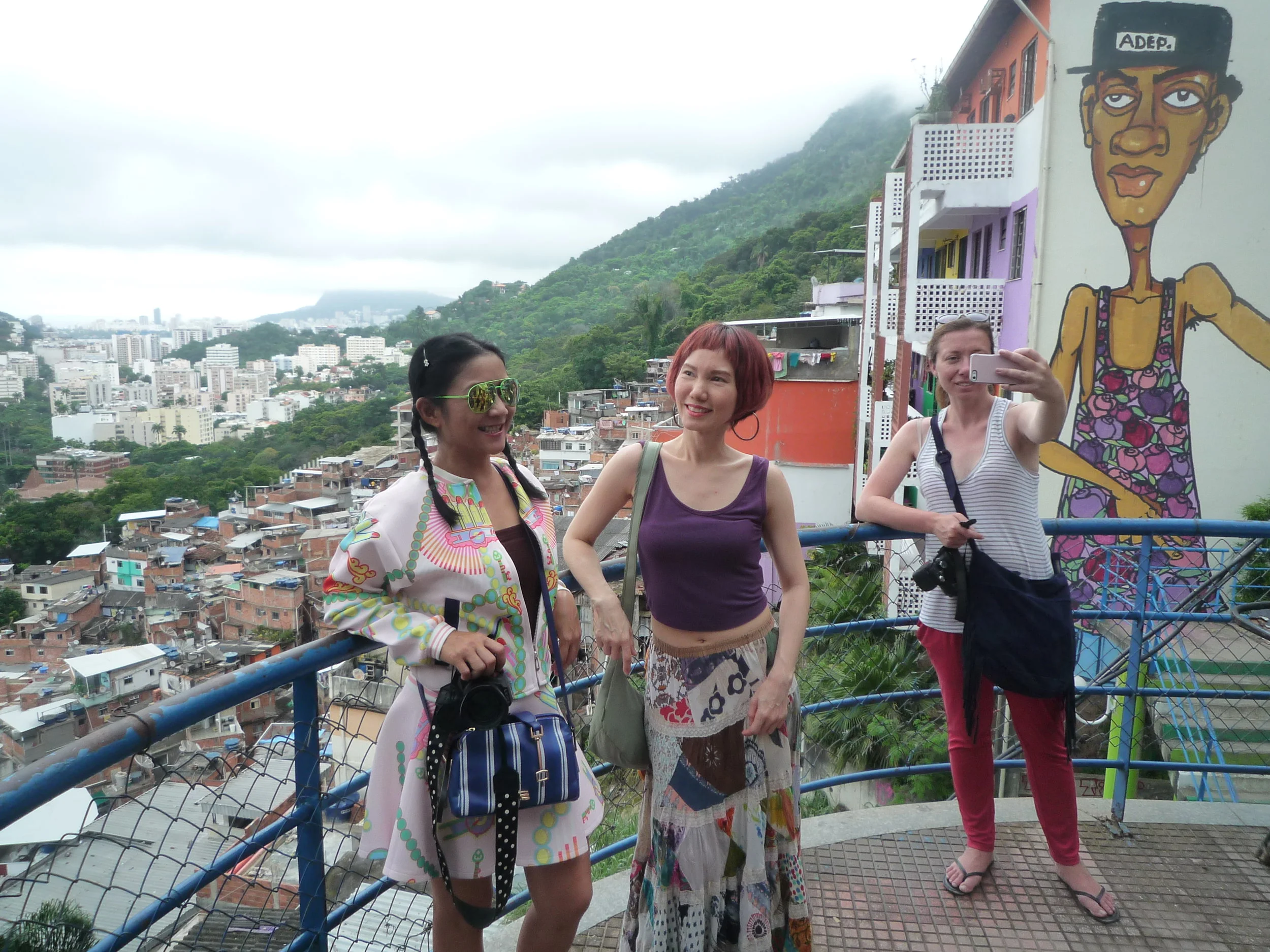 Tourists take pictures in Favela Santa Marta, Nov. 2015.