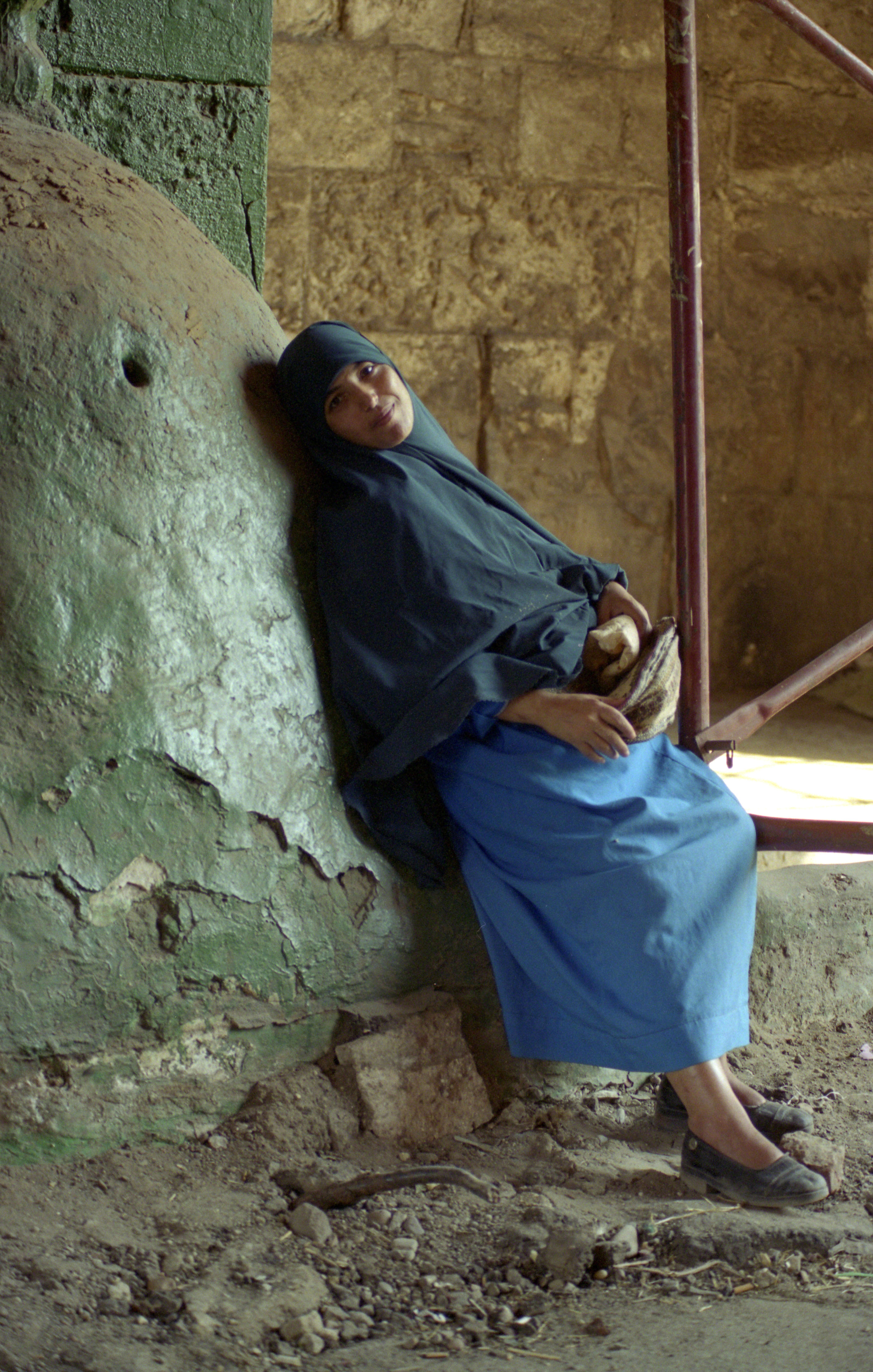Woman in Blue, Leaning, Cairo, Egypt W.jpg