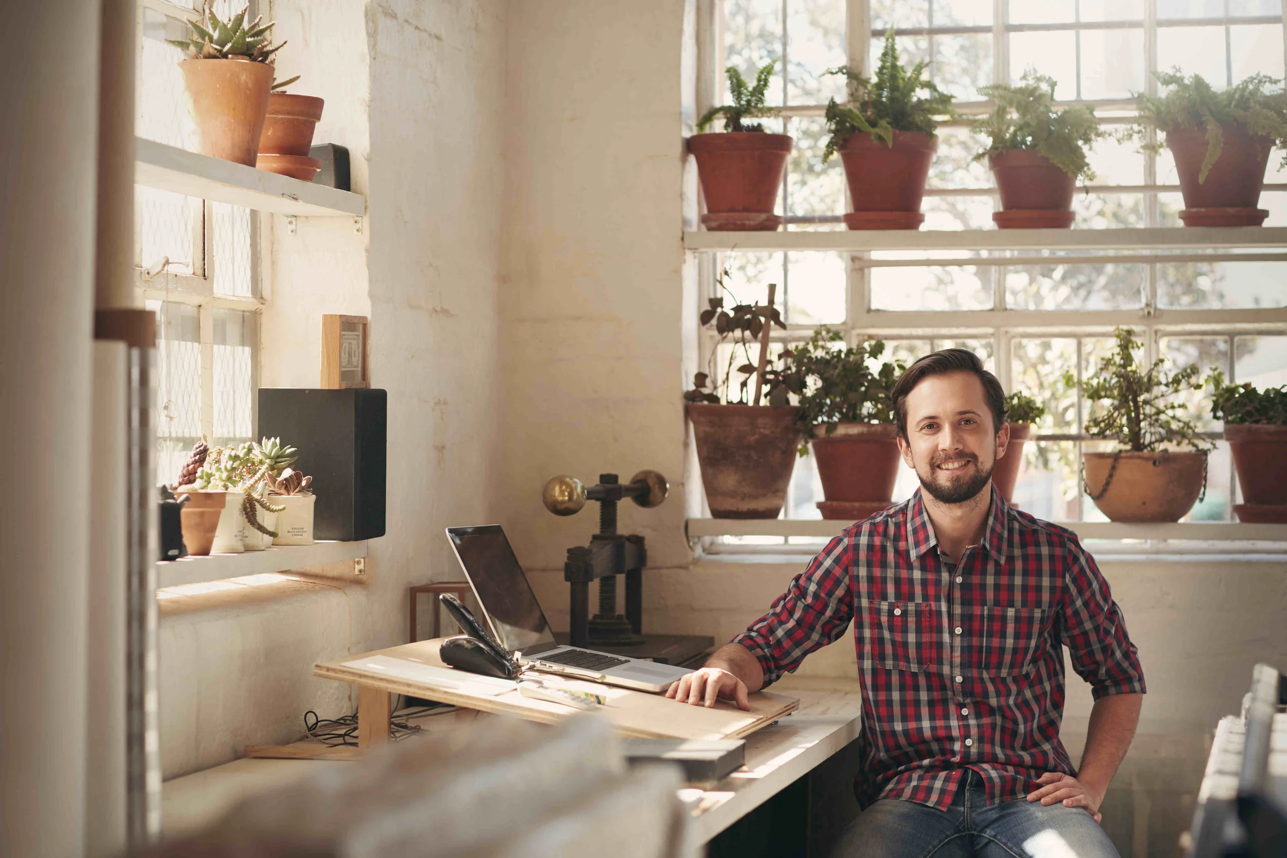 small-business-owner-white-male-office-with-plants.jpg