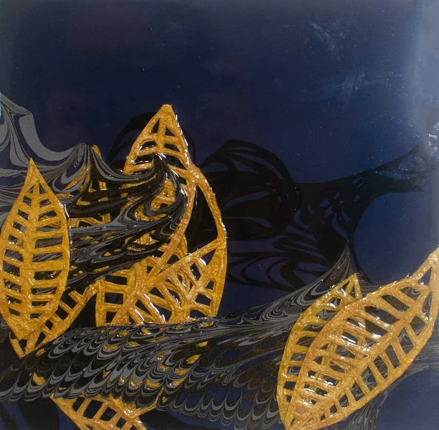  In the Waves 
 2025, 6 x 6 in, Hand cut embossed and marbled paper, and resin 