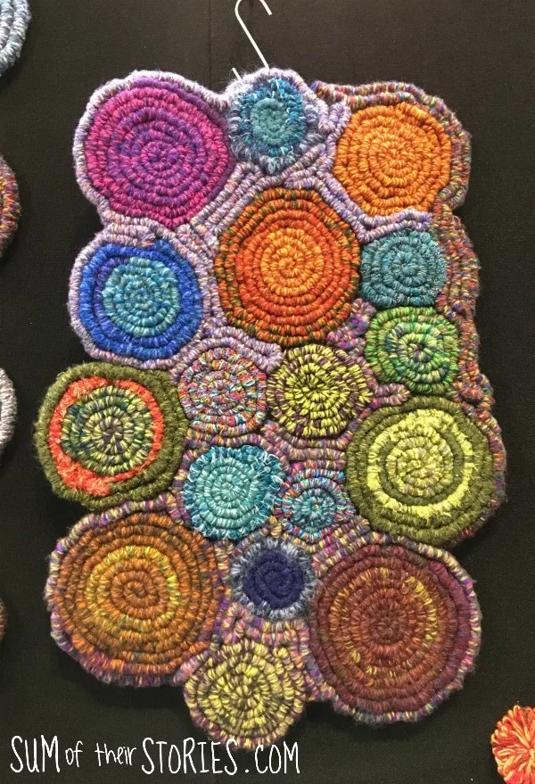 coiled rug made from woven strips