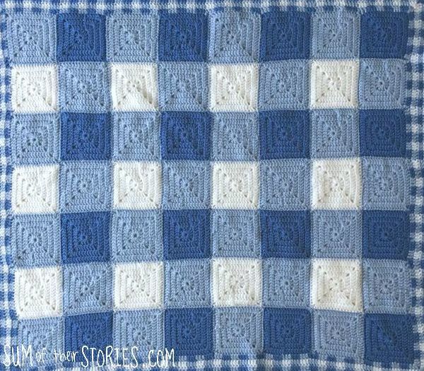 blue and white granny square baby afghan