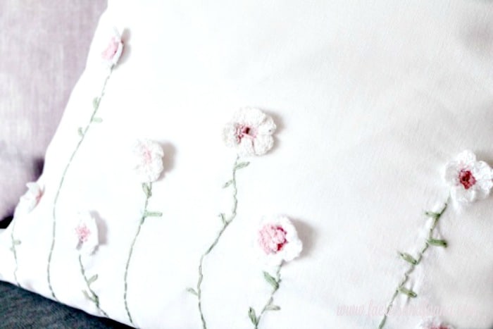 Crochet-flowers-closeup-on-a-DIY-Spring-Cushion-Cover.jpg