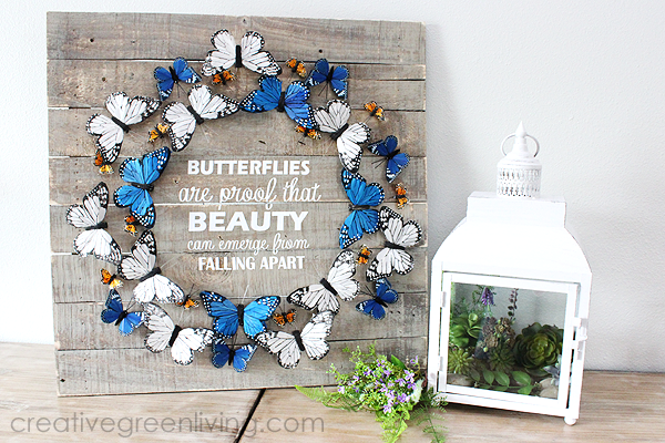 Farmhouse style butterfly decor ideas - indoor wreath on a pallet board with saying 'butterflies are proof that beauty can emerge from falling apart'.png