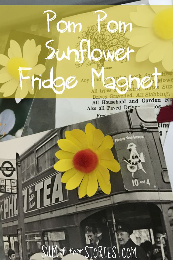 A paper sunflower with brown pom pom centre made into a fridge magnet