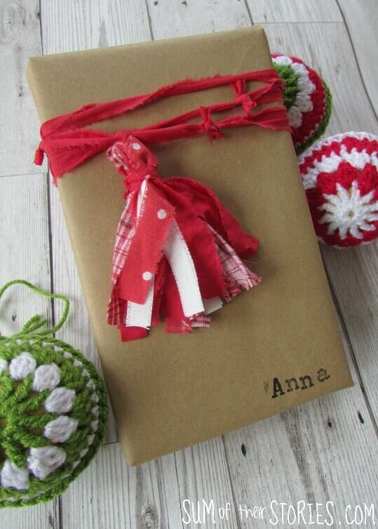gift wrap with a fabric tassel