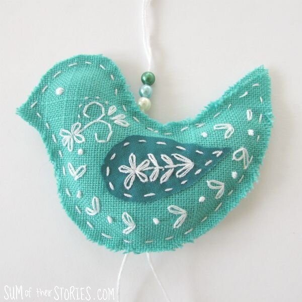 embroidered hanging bird.jpg