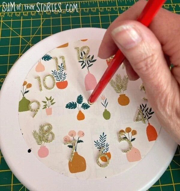 poke hole with pencil.jpeg