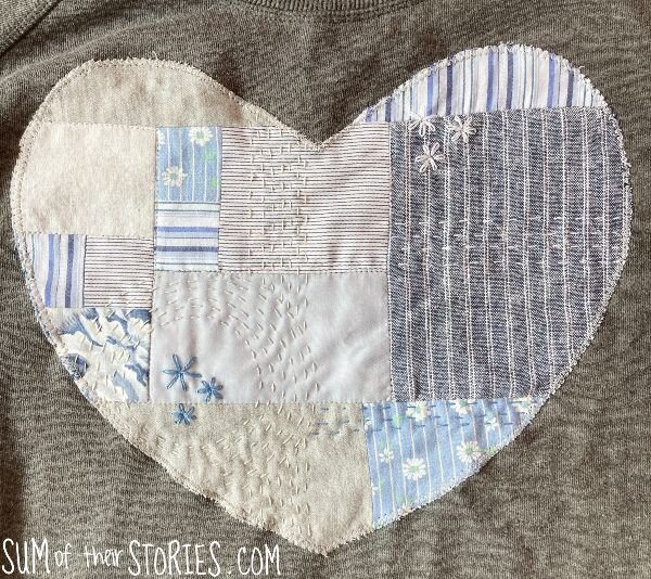finished embroidered grey and blue patchwork heart