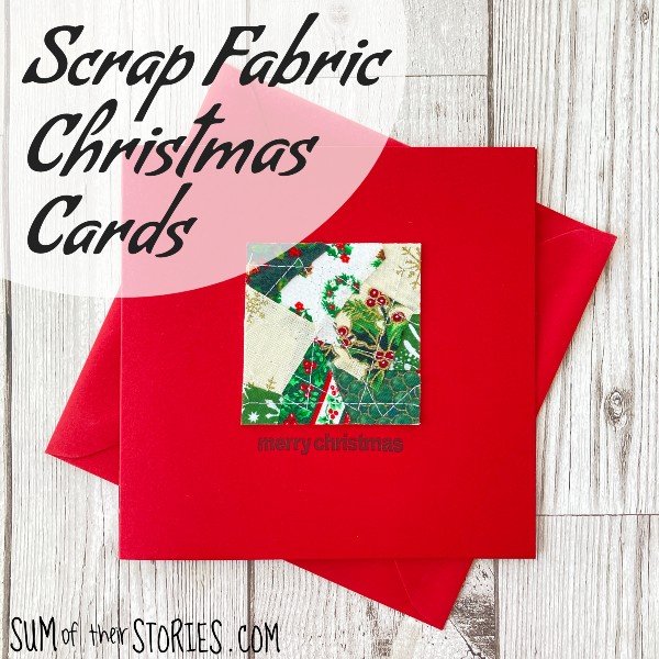 A red Christmas card with a square of patchworked fabric scraps