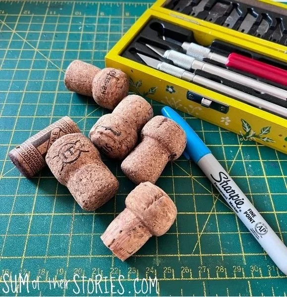 old corks a sharpie and craft knife to make a cork printing stamp
