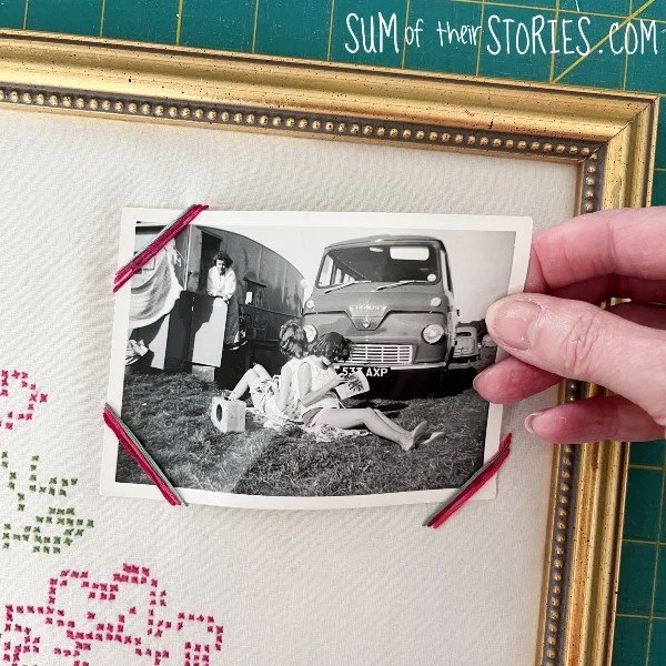 putting a photo into a diy fabric covered photo frame
