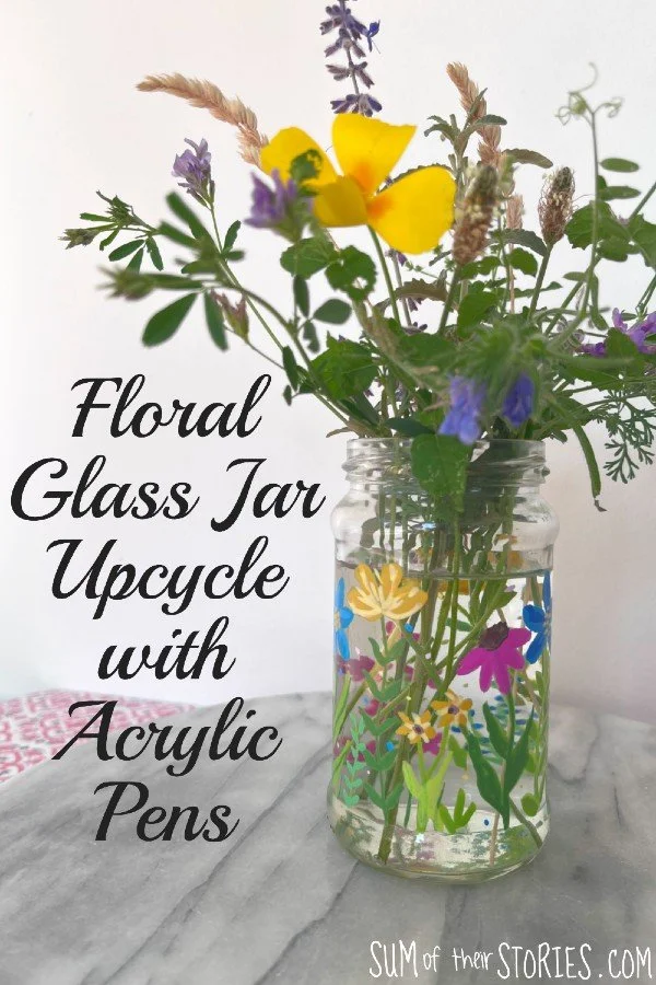glass jar vase decorated with a floral design with acrylic pens