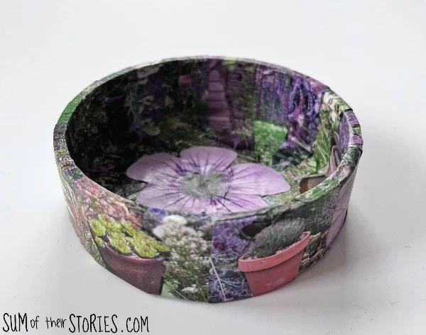 trinket dish covered with old gardening magazine cut outs
