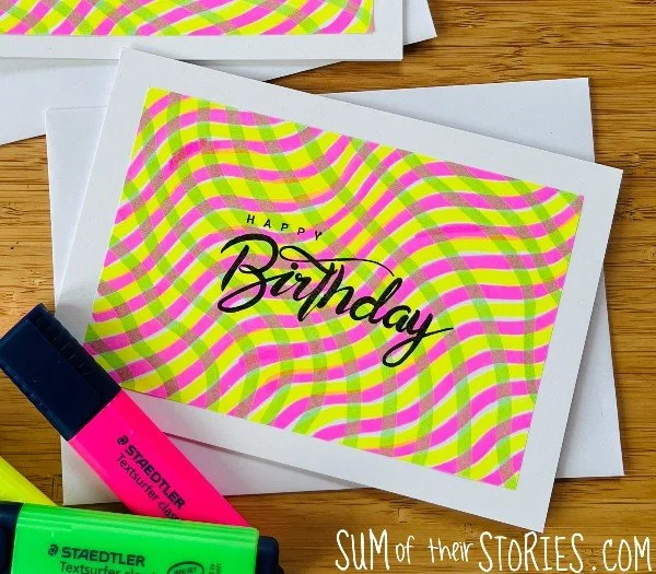 an easy handmade birthday card with a greeting stamped on a highlighter pen background