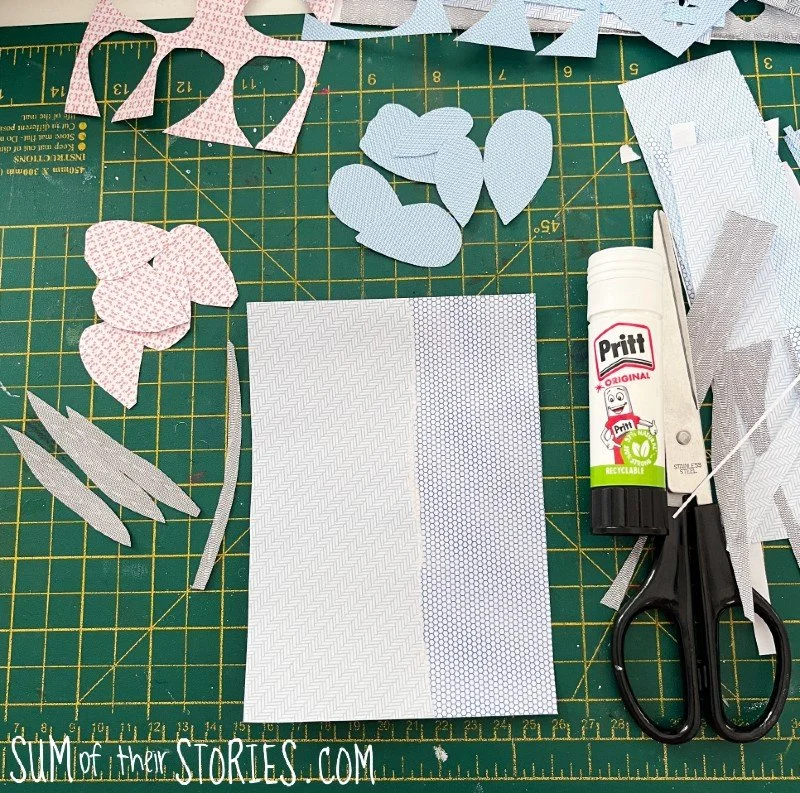 pieces of paper cut ready to make a flower collage