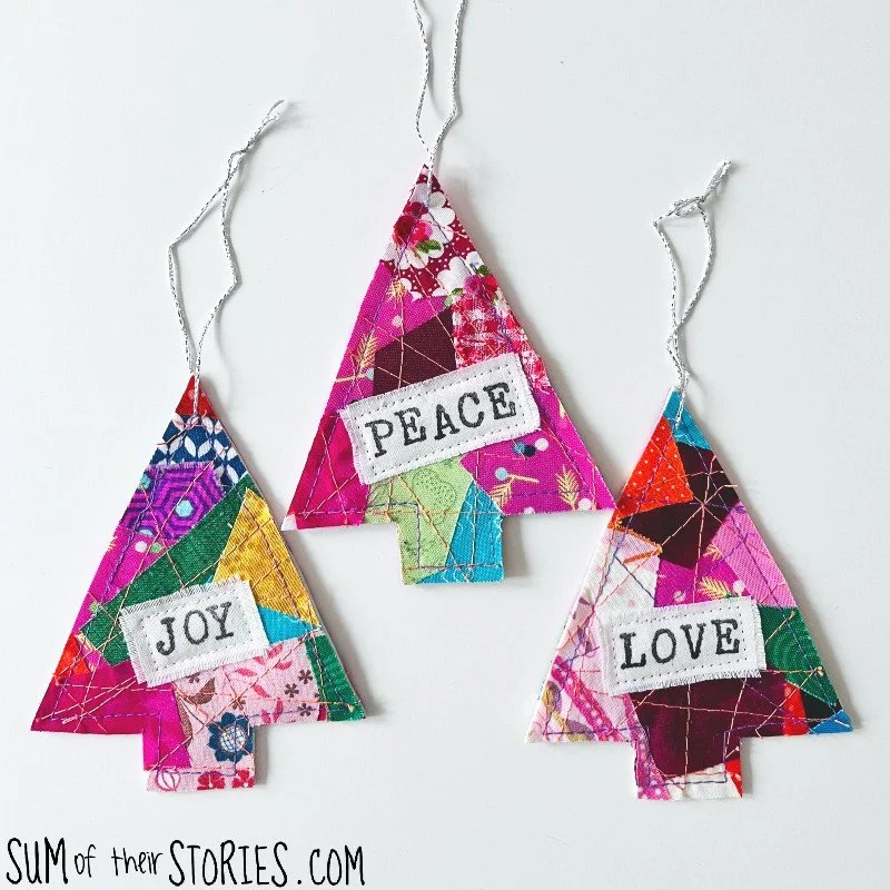 3 christmas tree ornaments made from colourful fabric crumbs