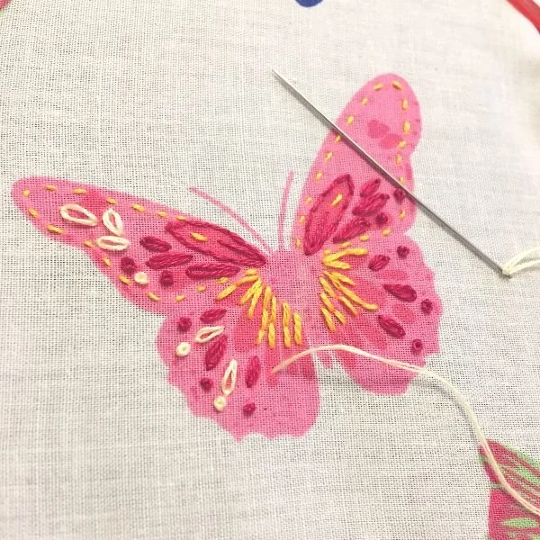 pink embroidered butterfly.jpg