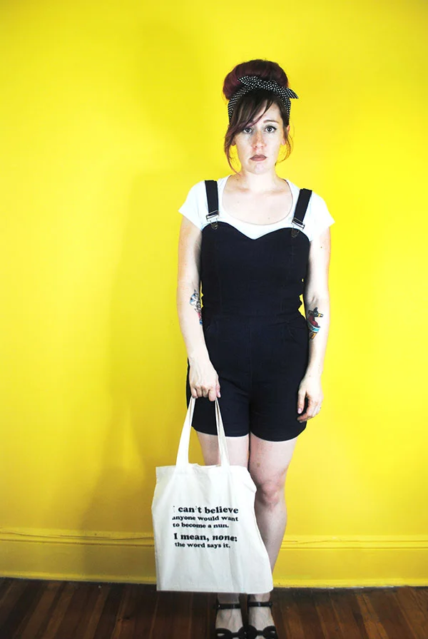 Nun_standing_yellow wall2_600W.jpg