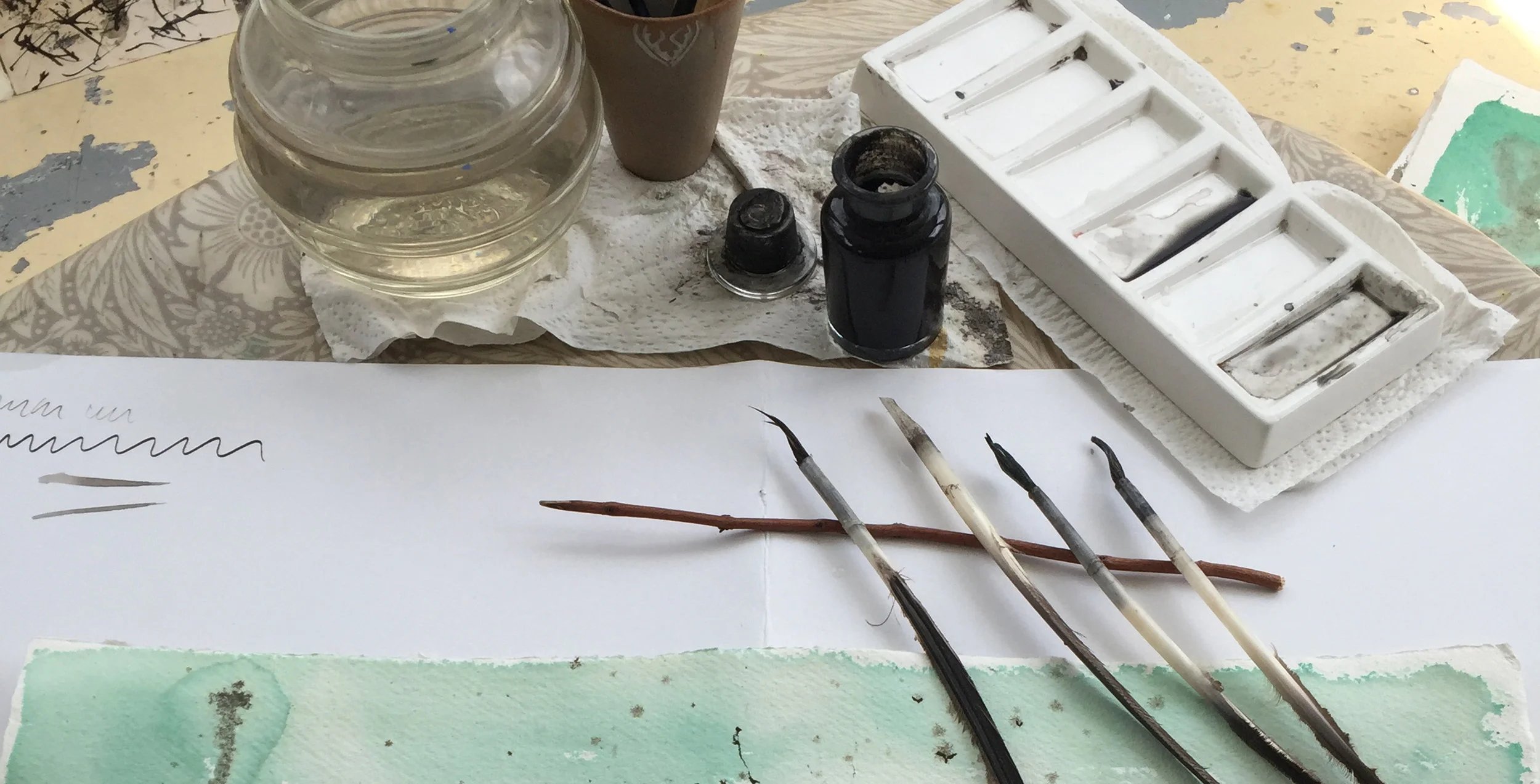 Quill pens, brushes and oak gall ink. Photo courtesy of Caroline Ross.