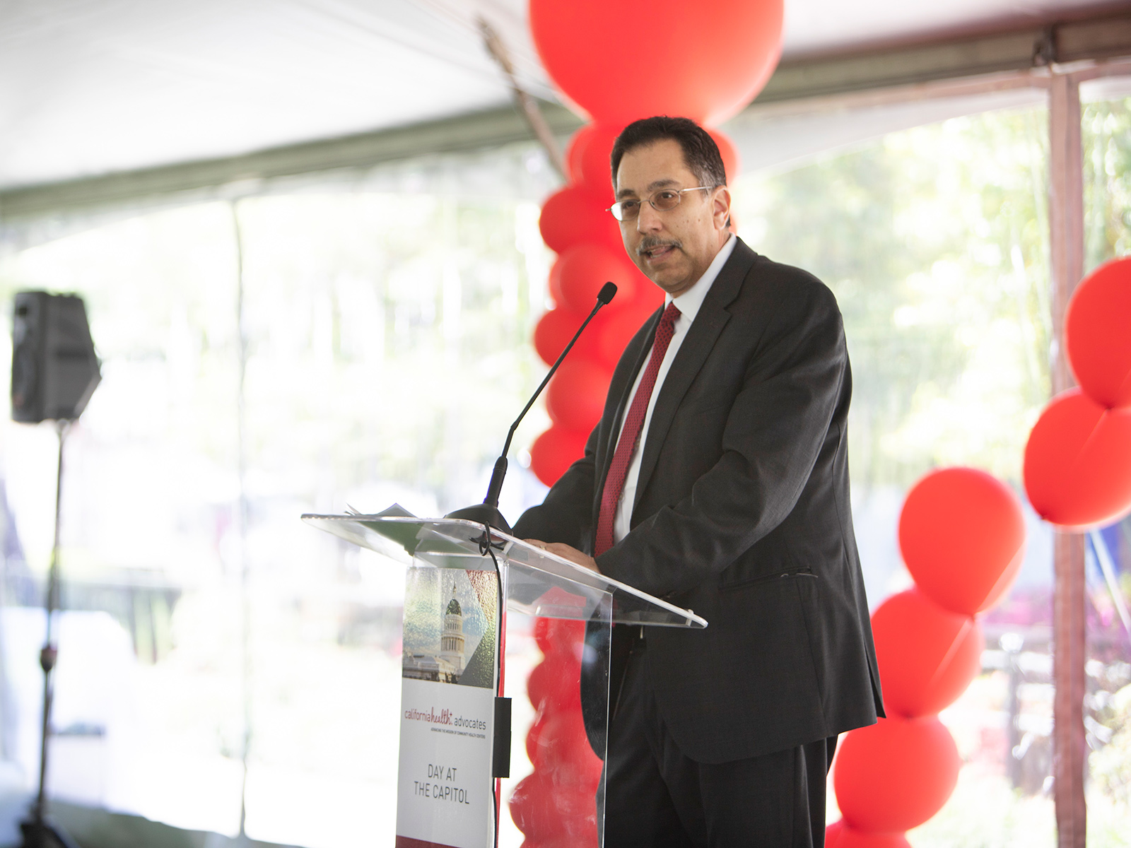 Deputy Cabinet Secretary, Richard Figueroa, speaks to attendees during the annual Day at the Capitol luncheon