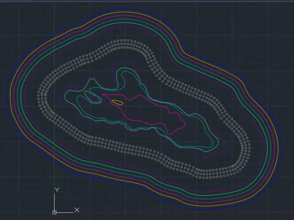  After tracing and processing each layer, I created an offset border, and used this to create the hole pattern and the out border for each of the layers. 